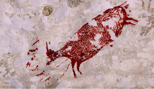 Pintura rupestre hallada en la isla indonesia de Sulawesi Pintura rupestre hallada en la isla indonesia de Sulawesi