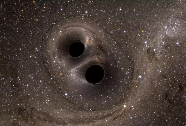Sistema binario de agujeros negros al fusionarse